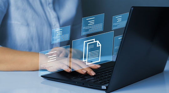 Person using a laptop with digital document icons, representing online processing for Monaco residency, residency permit applications, and applying for residency in Monaco.